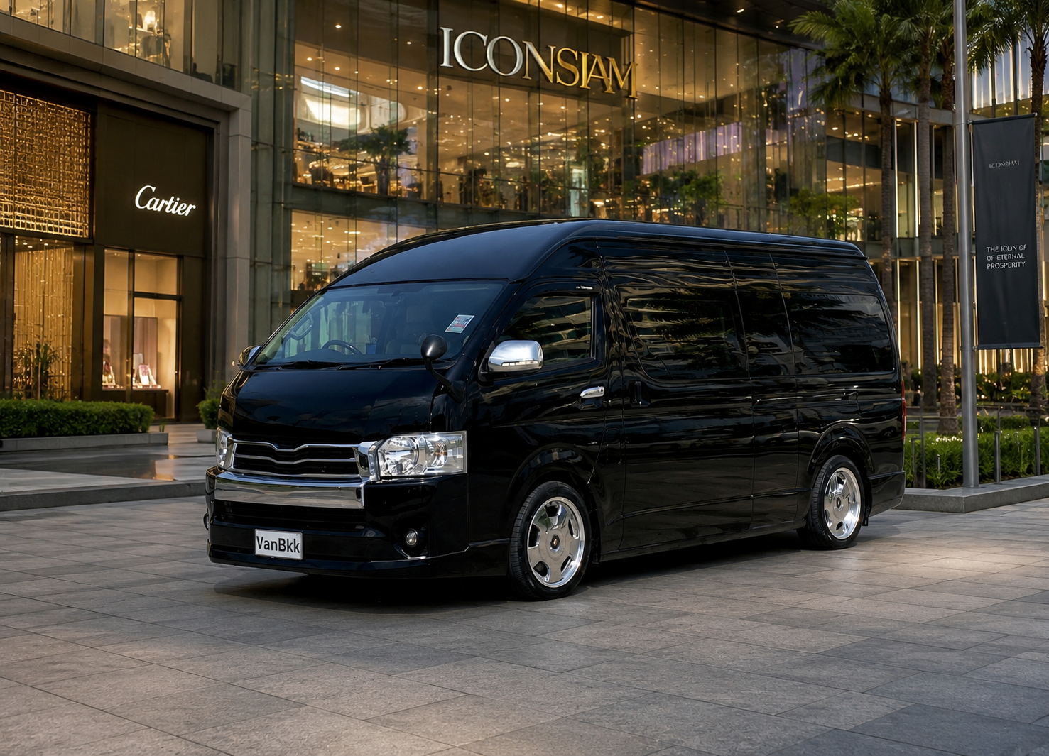 Interior of the VANBKK luxury van with black leather seats and ambient lighting
